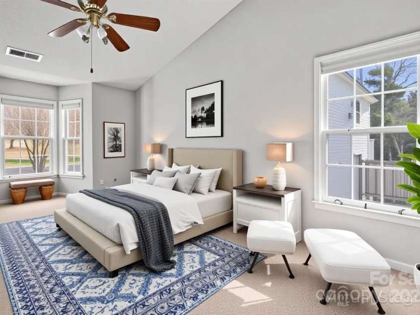 8802 Glenside Street, Huntersville, NC 28078.  MLS# CAR4225833, YatesRealty ID 31376. The primary bedroom has a vaulted ceiling and bay window.