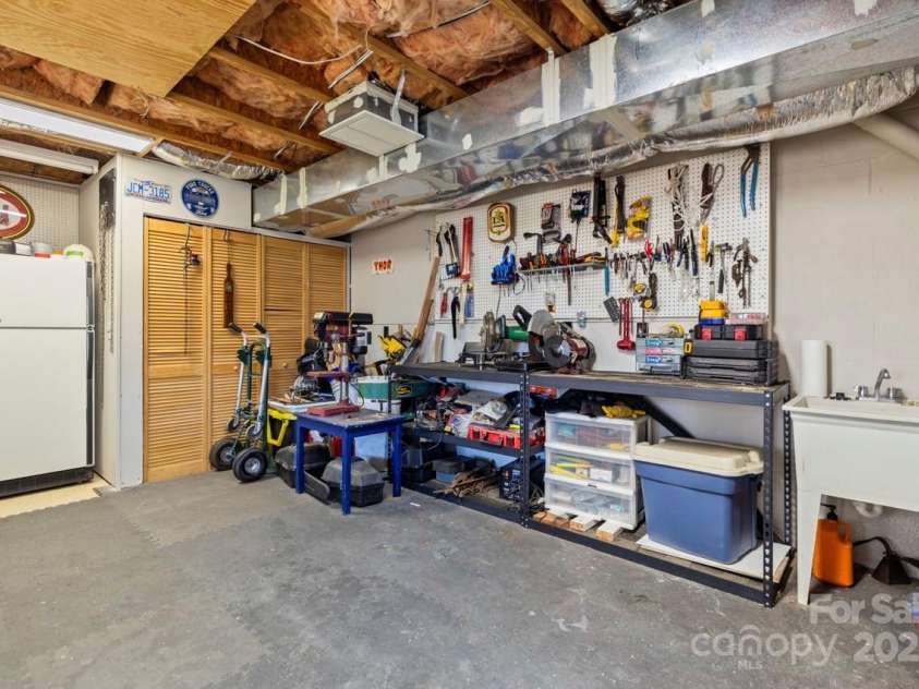 8802 Glenside Street, Huntersville, NC 28078.  MLS# CAR4316716, YatesRealty ID 31376. 333 square feet of heated workroom space in basement.
