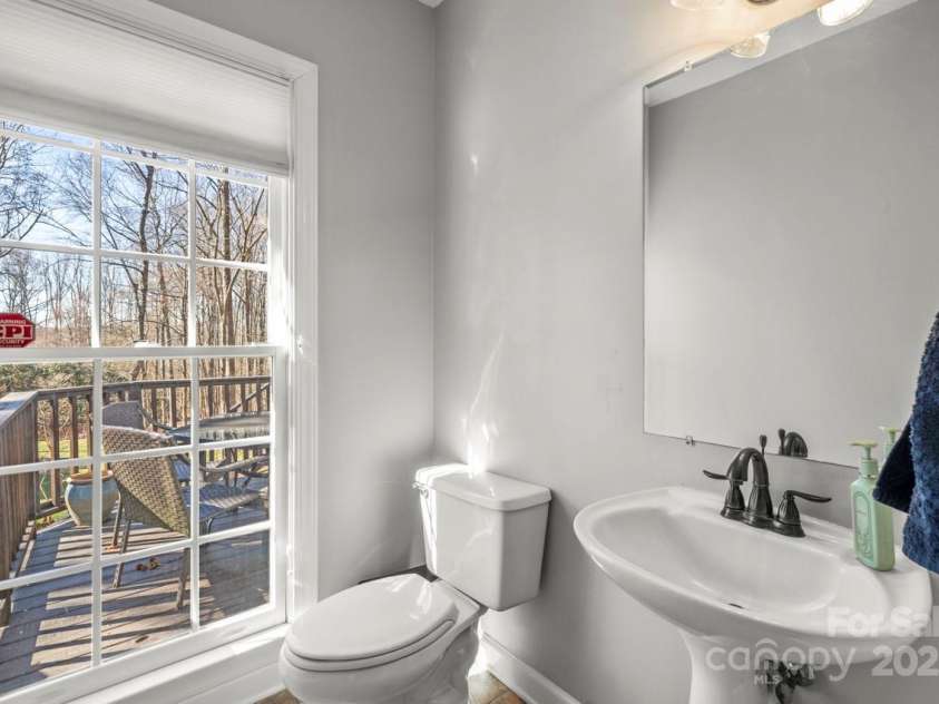 8802 Glenside Street, Huntersville, NC 28078.  MLS# CAR4316716, YatesRealty ID 31376. Convenient main floor powder room.