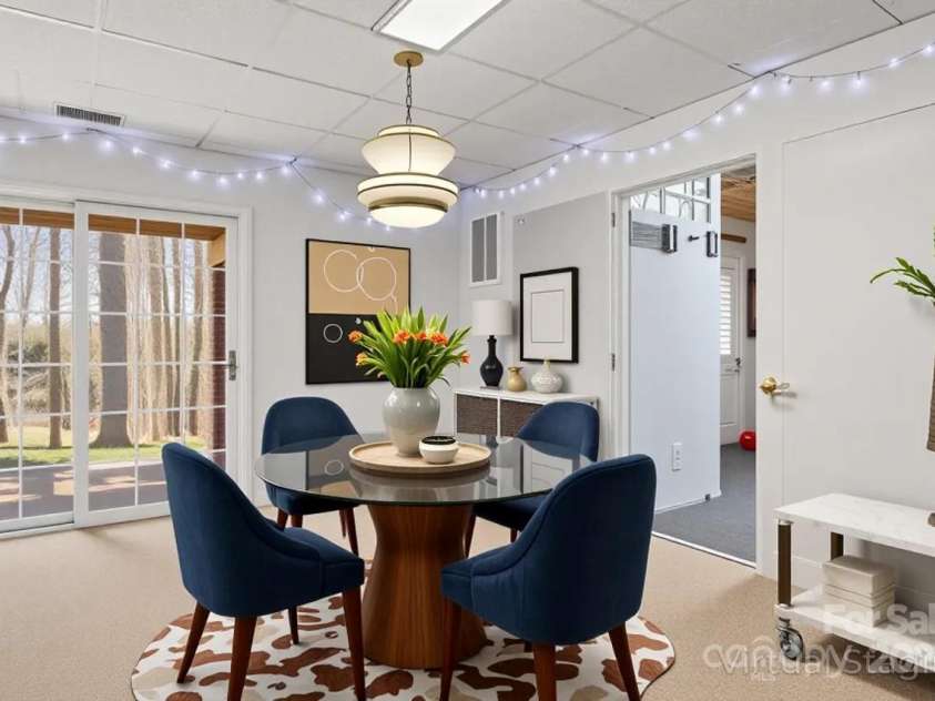 8802 Glenside Street, Huntersville, NC 28078.  MLS# CAR4316716, YatesRealty ID 31376. Dining space or card/game table in basement (virtually staged).