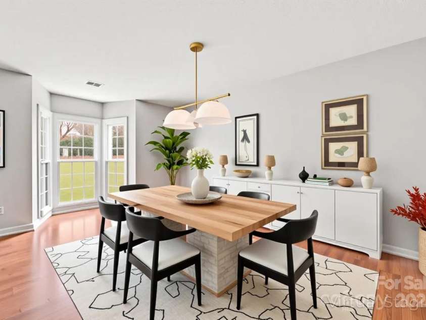 8802 Glenside Street, Huntersville, NC 28078.  MLS# CAR4316716, YatesRealty ID 31376. Spacious dining room with bay window (virtually staged).