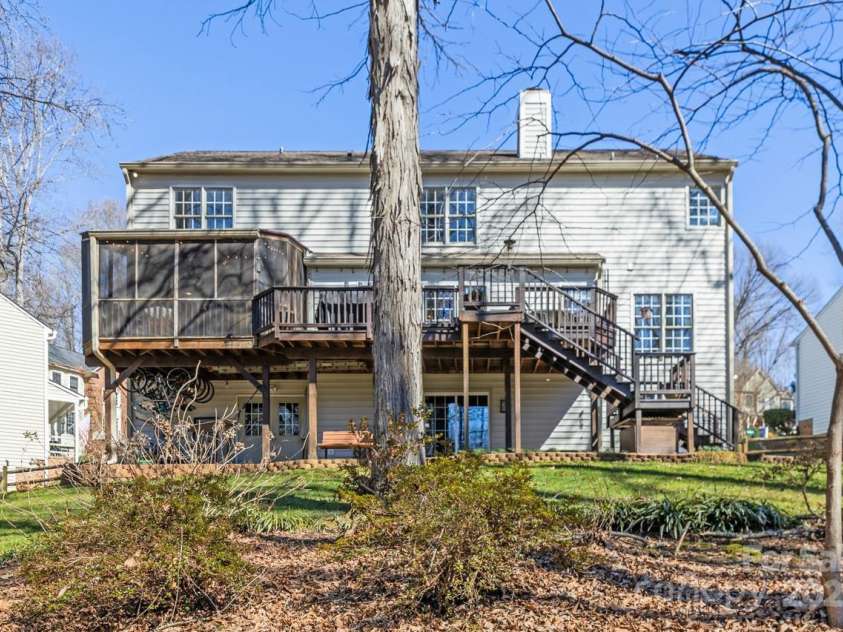 8802 Glenside Street, Huntersville, NC 28078.  MLS# CAR4316716, YatesRealty ID 31376. View of back of house. Notice that there are two exits from the basement.