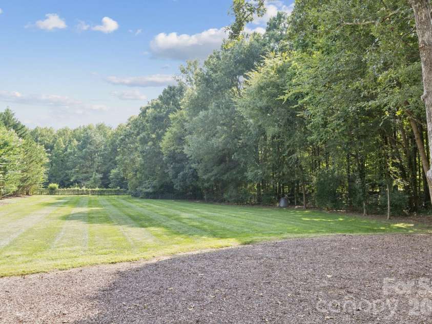 2900 Cutter Court, Waxhaw, NC 28173.  MLS# CAR4392971, YatesRealty ID 31378. Expansive Back Yard