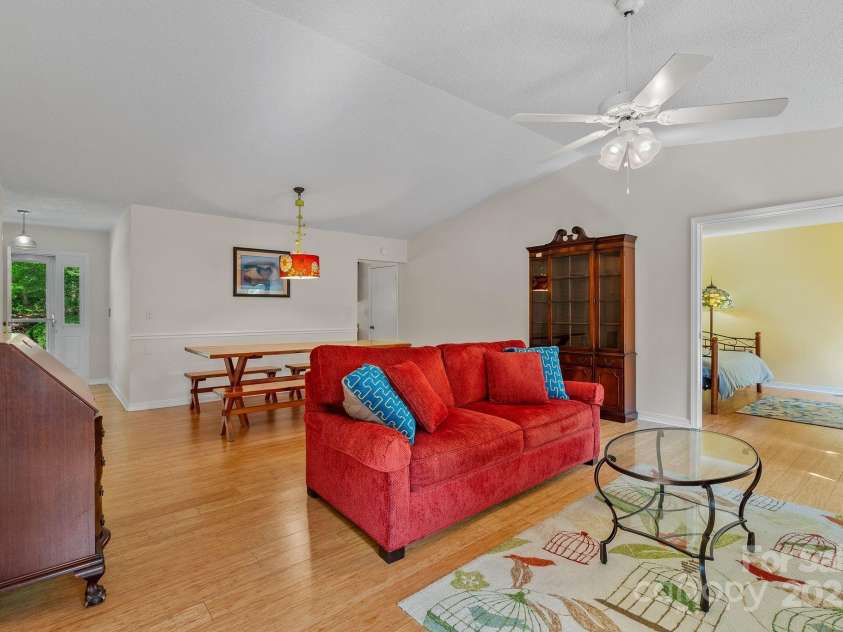 4-B HedgeRose Court, Asheville, NC 28805.  MLS# CAR4258653, YatesRealty ID 31392. A welcoming open and bright living area that connect to the kitchen and office (yellow) directly, with a hall (left) leading to the primary and second bedroom.