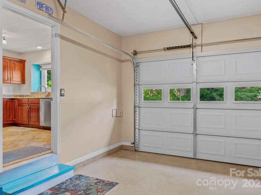 4-B HedgeRose Court, Asheville, NC 28805.  MLS# CAR4258653, YatesRealty ID 31392. Attached garage leads right to the kitchen...