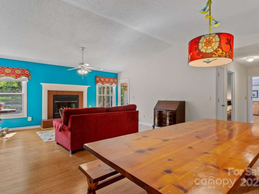 4-B HedgeRose Court, Asheville, NC 28805.  MLS# CAR4258653, YatesRealty ID 31392. View of living area from kitchen nook...