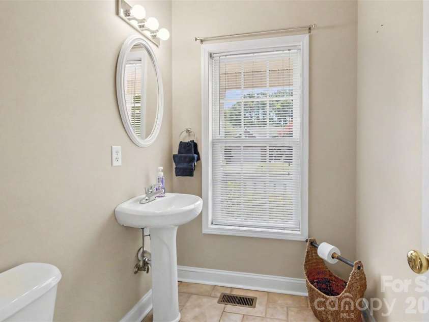 2762 Island Point Drive, Concord, NC 28027.  MLS# CAR4394127, YatesRealty ID 31393. Very spacious half bath on lower level