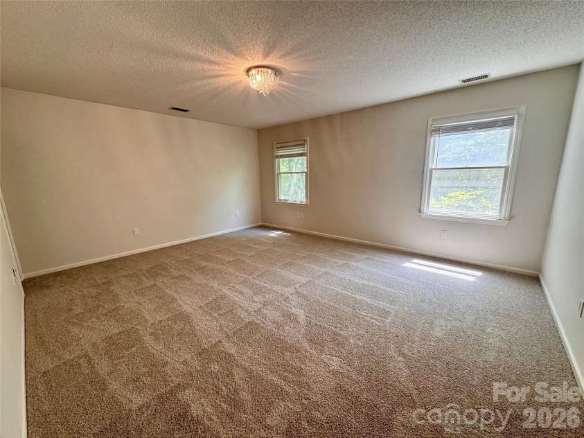 196 Flint Ridge Drive, Concord, NC 28025.  MLS# CAR4389532, YatesRealty ID 31397. Primary bedroom