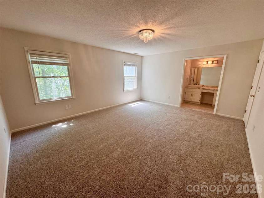 196 Flint Ridge Drive, Concord, NC 28025.  MLS# CAR4389532, YatesRealty ID 31397. Primary Bedroom