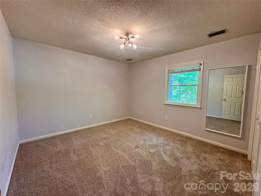 196 Flint Ridge Drive, Concord, NC 28025.  MLS# CAR4389532, YatesRealty ID 31397. Upstairs bedroom 3