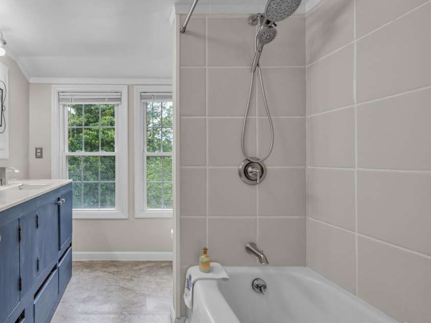 103 7th Street, Taylorsville, NC 28681.  MLS# CAR4285749, YatesRealty ID 31398. 2nd Story Hall Bathroom