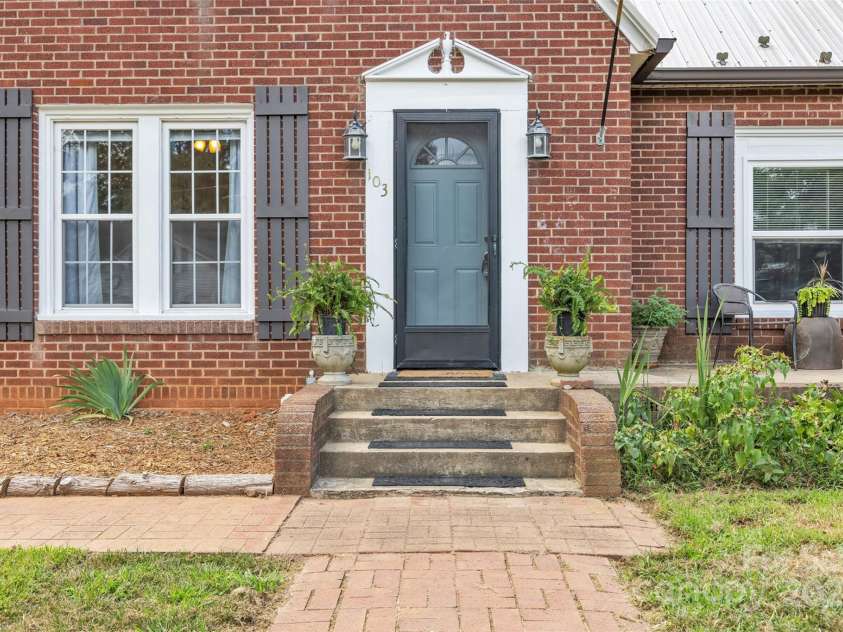 103 7th Street, Taylorsville, NC 28681.  MLS# CAR4285749, YatesRealty ID 31398. Relax on the front patio