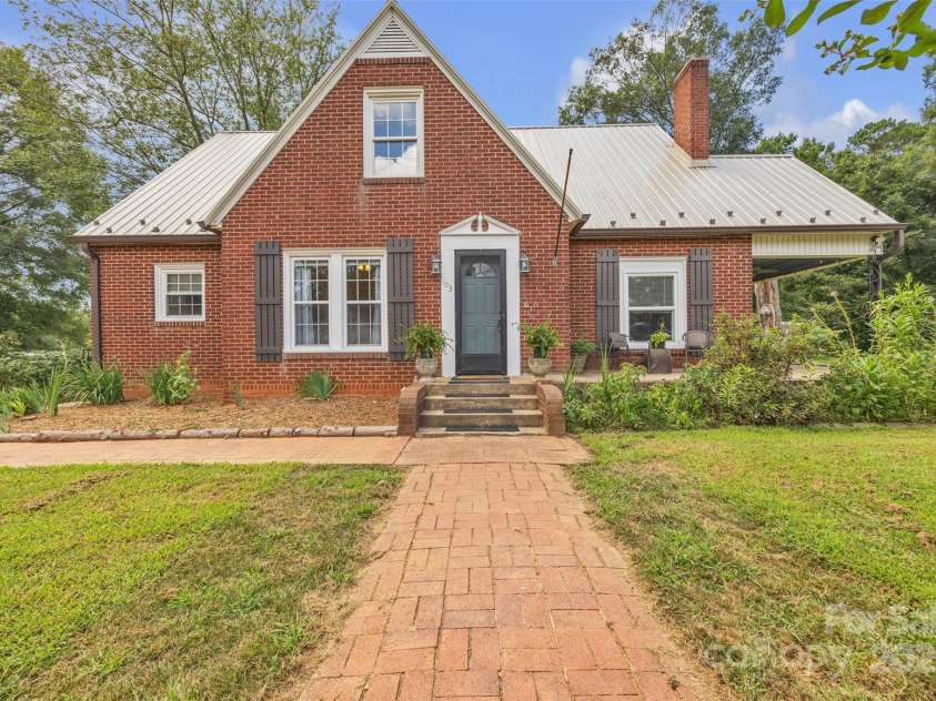 103 7th Street, Taylorsville, NC 28681.  MLS# CAR4285749, YatesRealty ID 31398. Two-Story home on almost 1/2 an acre