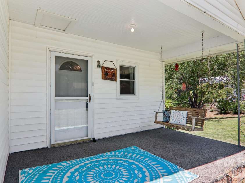 414 Skyline Drive, Canton, NC 28716.  MLS# CAR4394964, YatesRealty ID 31399. Covered front porch