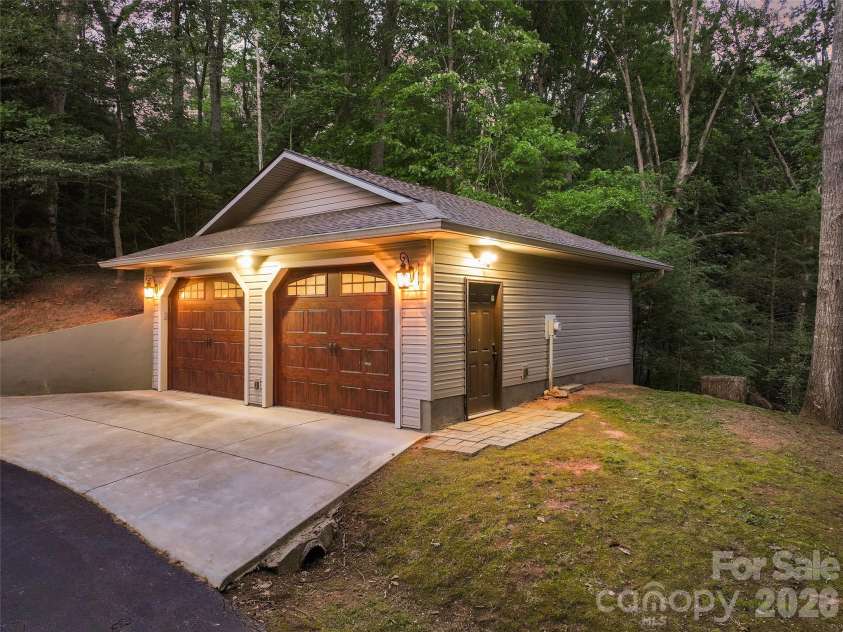 359 Saddlebrook Lane, Clyde, NC 28721.  MLS# CAR4393520, YatesRealty ID 31400. Detached two-caregarage