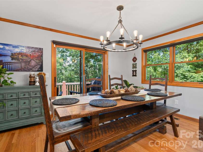 359 Saddlebrook Lane, Clyde, NC 28721.  MLS# CAR4393520, YatesRealty ID 31400. Dining area with tons of light