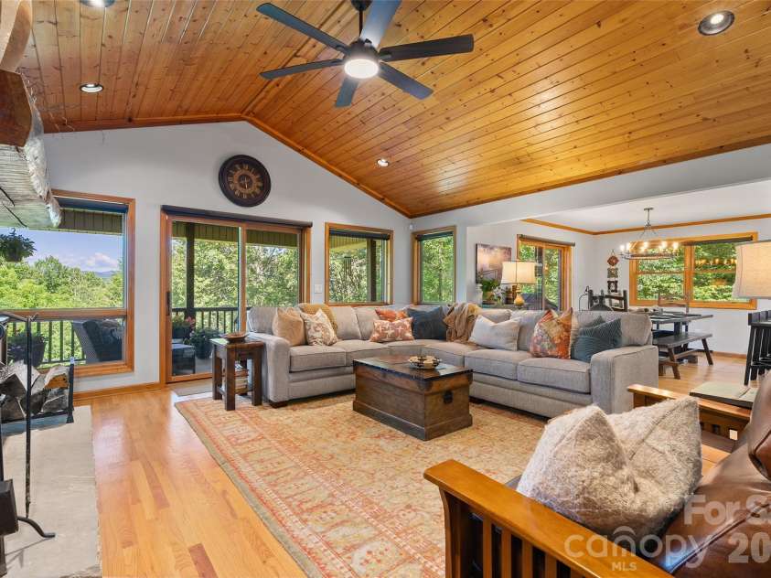359 Saddlebrook Lane, Clyde, NC 28721.  MLS# CAR4393520, YatesRealty ID 31400. Living to dining area