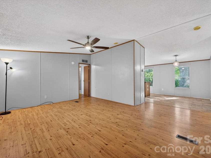 403 Doliver Drive, Horse Shoe, NC 28742.  MLS# CAR4390350, YatesRealty ID 31406. Main living area looking from front door.