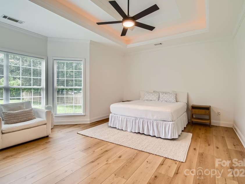 4120 Waxwood Drive, Monroe, NC 28110.  MLS# CAR4279472, YatesRealty ID 31408. Large primary bedroom with bay window.