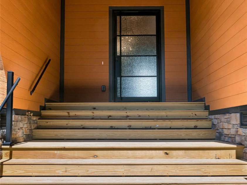 129 Parkway View Drive, Hendersonville, NC 28739.  MLS# CAR4258845, YatesRealty ID 31411. Dramatic iron door makes memorable first impression