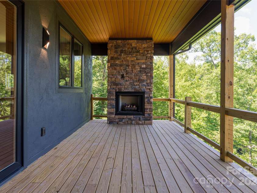 129 Parkway View Drive, Hendersonville, NC 28739.  MLS# CAR4258845, YatesRealty ID 31411. Enjoy sunset cocktails, morning coffee, or star-filled nights on the back deck