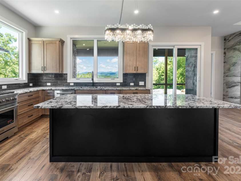 129 Parkway View Drive, Hendersonville, NC 28739.  MLS# CAR4258845, YatesRealty ID 31411. Entertaining is a breeze in the spacious custom kitchen