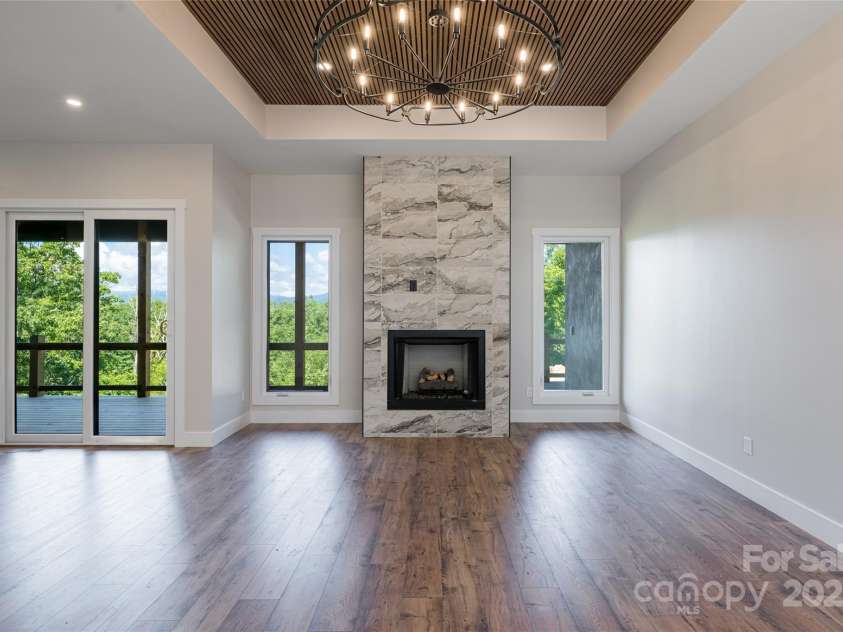 129 Parkway View Drive, Hendersonville, NC 28739.  MLS# CAR4258845, YatesRealty ID 31411. Floor to ceiling stone fireplace