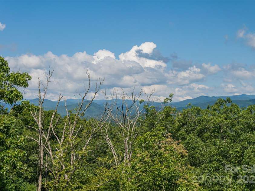 129 Parkway View Drive, Hendersonville, NC 28739.  MLS# CAR4258845, YatesRealty ID 31411. Layered mountain views