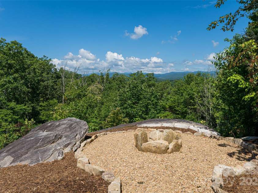 129 Parkway View Drive, Hendersonville, NC 28739.  MLS# CAR4258845, YatesRealty ID 31411. Natural boulder outcropping