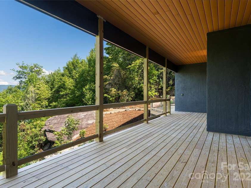 129 Parkway View Drive, Hendersonville, NC 28739.  MLS# CAR4258845, YatesRealty ID 31411. Partially covered back deck