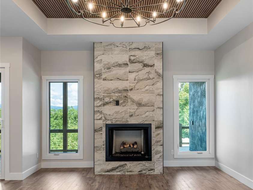 129 Parkway View Drive, Hendersonville, NC 28739.  MLS# CAR4258845, YatesRealty ID 31411. Soaring ceilings with warm slatted wooden features