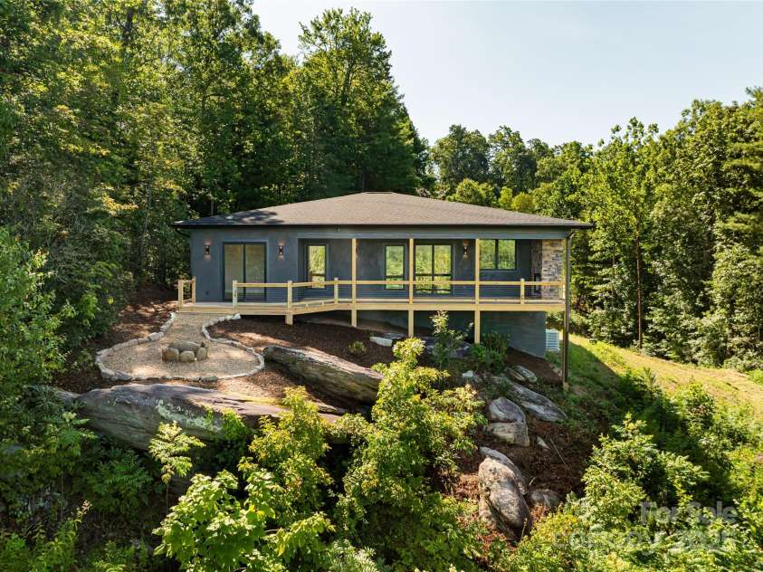 129 Parkway View Drive, Hendersonville, NC 28739.  MLS# CAR4258845, YatesRealty ID 31411. Take in sunset views and relax on covered deck with gas fireplace
