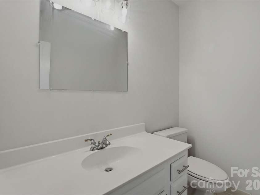2341 Hamilton Mill Road, Charlotte, NC 28270.  MLS# CAR4391403, YatesRealty ID 31412. Downstairs half bath