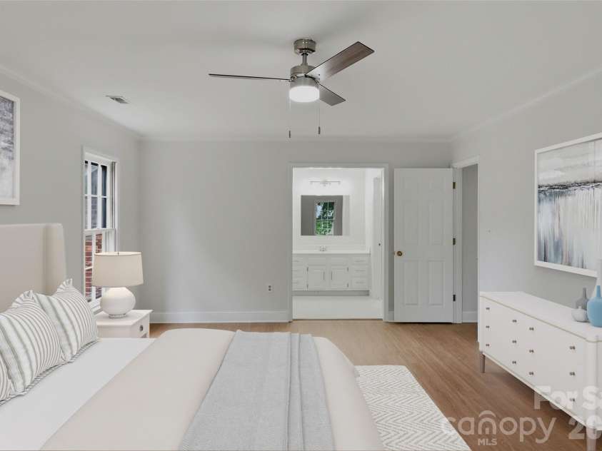 2341 Hamilton Mill Road, Charlotte, NC 28270.  MLS# CAR4391403, YatesRealty ID 31412. New LVP flooring throughout primary bedroom *Virtually staged*