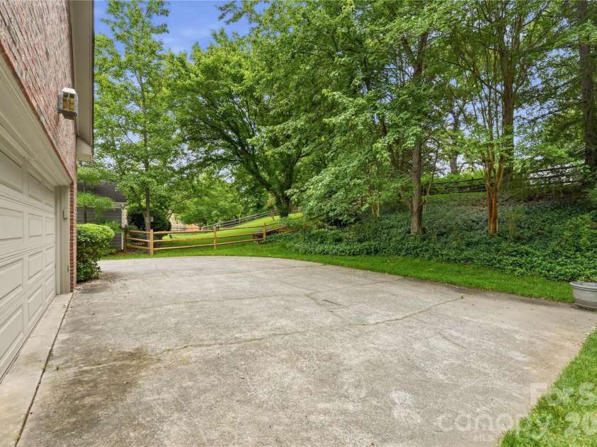 2341 Hamilton Mill Road, Charlotte, NC 28270.  MLS# CAR4391403, YatesRealty ID 31412. Rear load garage