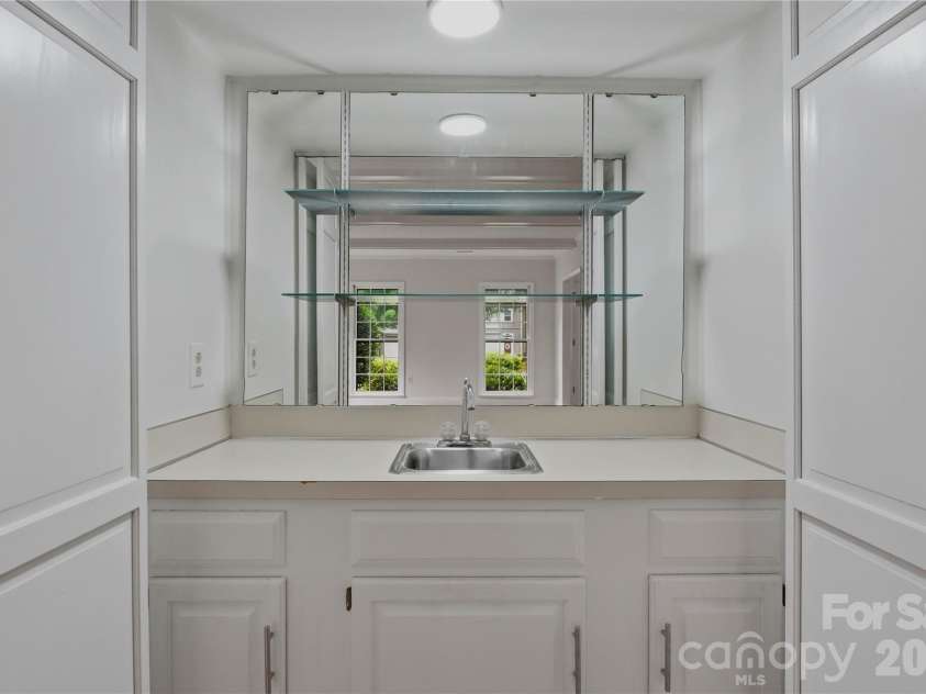 2341 Hamilton Mill Road, Charlotte, NC 28270.  MLS# CAR4391403, YatesRealty ID 31412. Wet bar in den