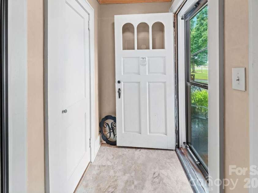 1832 Badin Road, Albemarle, NC 28001.  MLS# CAR4392071, YatesRealty ID 31414. Front Door Entrance includes a large hall closet. 