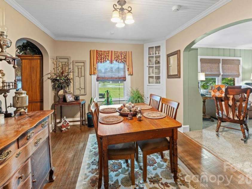 1832 Badin Road, Albemarle, NC 28001.  MLS# CAR4392071, YatesRealty ID 31414. The dining room has an original built in corner cabinet.