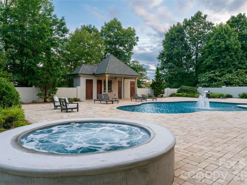 316 Braeside Court, Asheville, NC 28803.  MLS# CAR4198099, YatesRealty ID 3143. Private back yard oasis, complete with pool house and recently re-finished and tiled Hot tub and Pool
