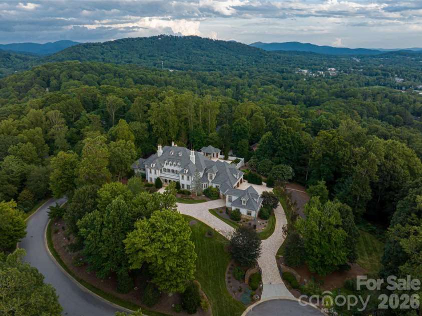 316 Braeside Court, Asheville, NC 28803.  MLS# CAR4198099, YatesRealty ID 3143. This European-inspired estate is set on 2.5 acres of beautifully landscaped, level land at the pinnacle of Biltmore Park with year-round views!