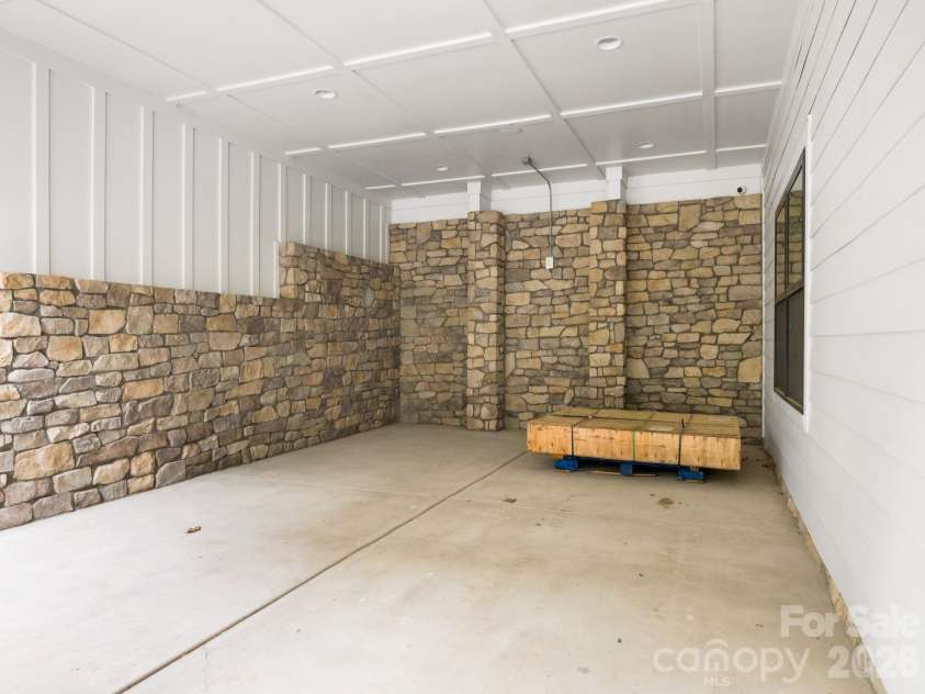3601 Woody Grove Lane, Charlotte, NC 28210.  MLS# CAR4380181, YatesRealty ID 31430. Covered Lower Patio