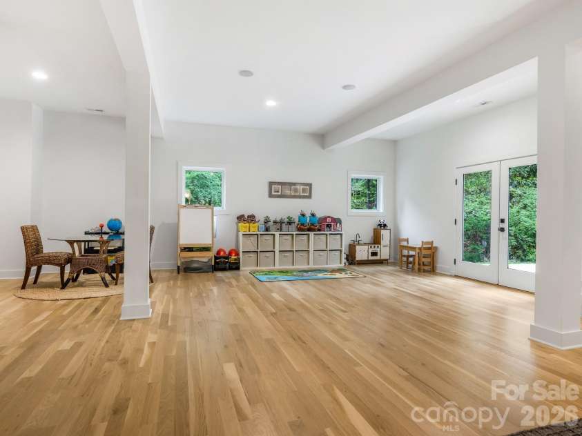 3601 Woody Grove Lane, Charlotte, NC 28210.  MLS# CAR4380181, YatesRealty ID 31430. Lower Level Bonus Room