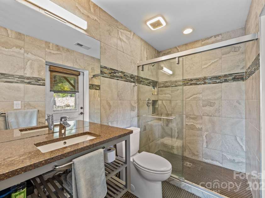 593 Buck Ridge Road, Waynesville, NC 28785.  MLS# CAR4288418, YatesRealty ID 31437. 