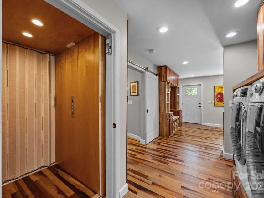 593 Buck Ridge Road, Waynesville, NC 28785.  MLS# CAR4288418, YatesRealty ID 31437. Lower level elevator