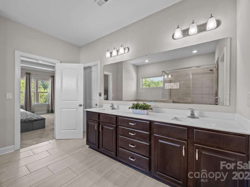 141 Rain Shadow Drive, Mooresville, NC 28115.  MLS# CAR4305913, YatesRealty ID 3144. Dual sinks & lots of storage