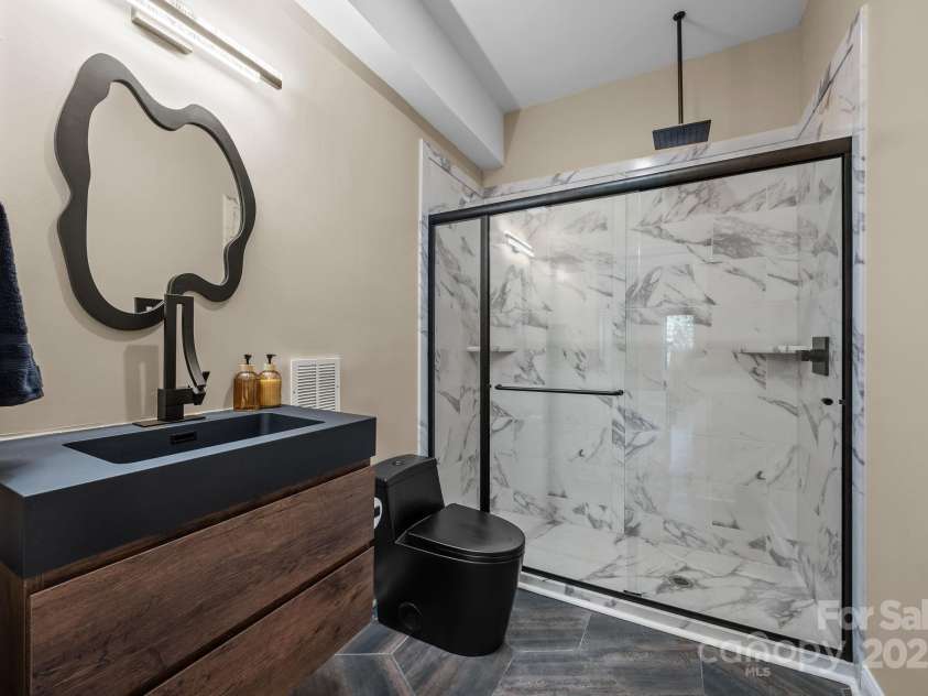 141 Rain Shadow Drive, Mooresville, NC 28115.  MLS# CAR4305913, YatesRealty ID 3144. Full Bath off the flex space