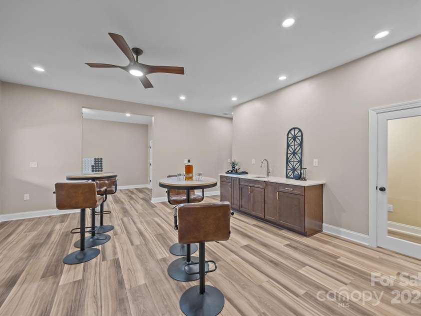 141 Rain Shadow Drive, Mooresville, NC 28115.  MLS# CAR4305913, YatesRealty ID 3144. Full Wet Bar - & Wine Closet