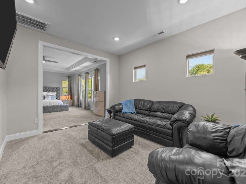 141 Rain Shadow Drive, Mooresville, NC 28115.  MLS# CAR4305913, YatesRealty ID 3144. Great place to unwind before retiring for the night