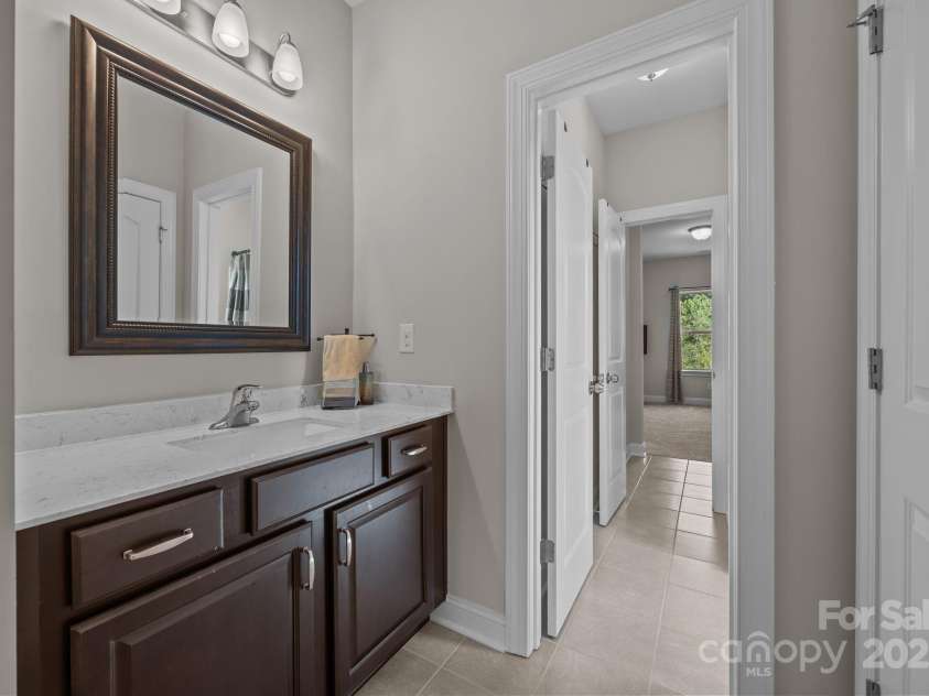 141 Rain Shadow Drive, Mooresville, NC 28115.  MLS# CAR4305913, YatesRealty ID 3144. Jack & Jill bath with separated vanities between bedrooms 3 & 5