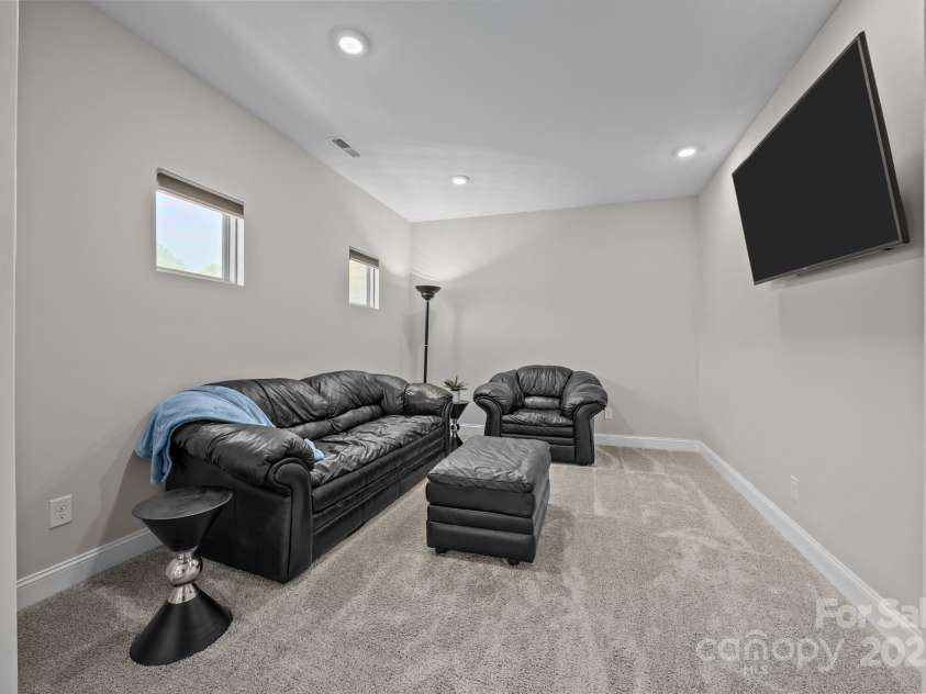 141 Rain Shadow Drive, Mooresville, NC 28115.  MLS# CAR4305913, YatesRealty ID 3144. Private Sitting room off the primary